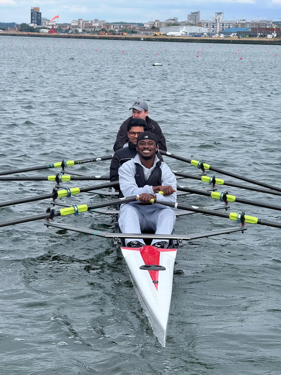 Gideon Wise rowing with his crew